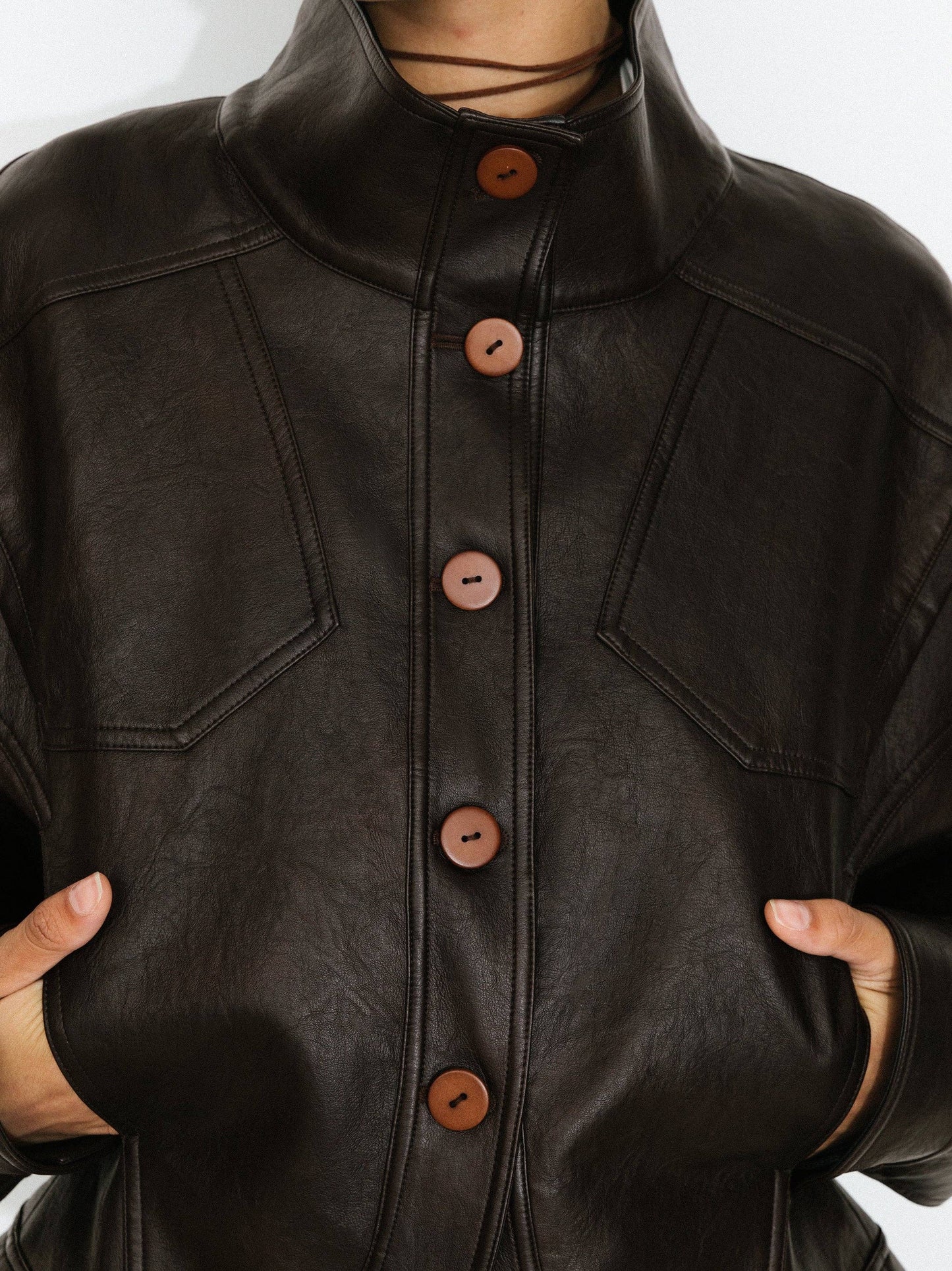 Curved Sleeve Faux Leather Jacket