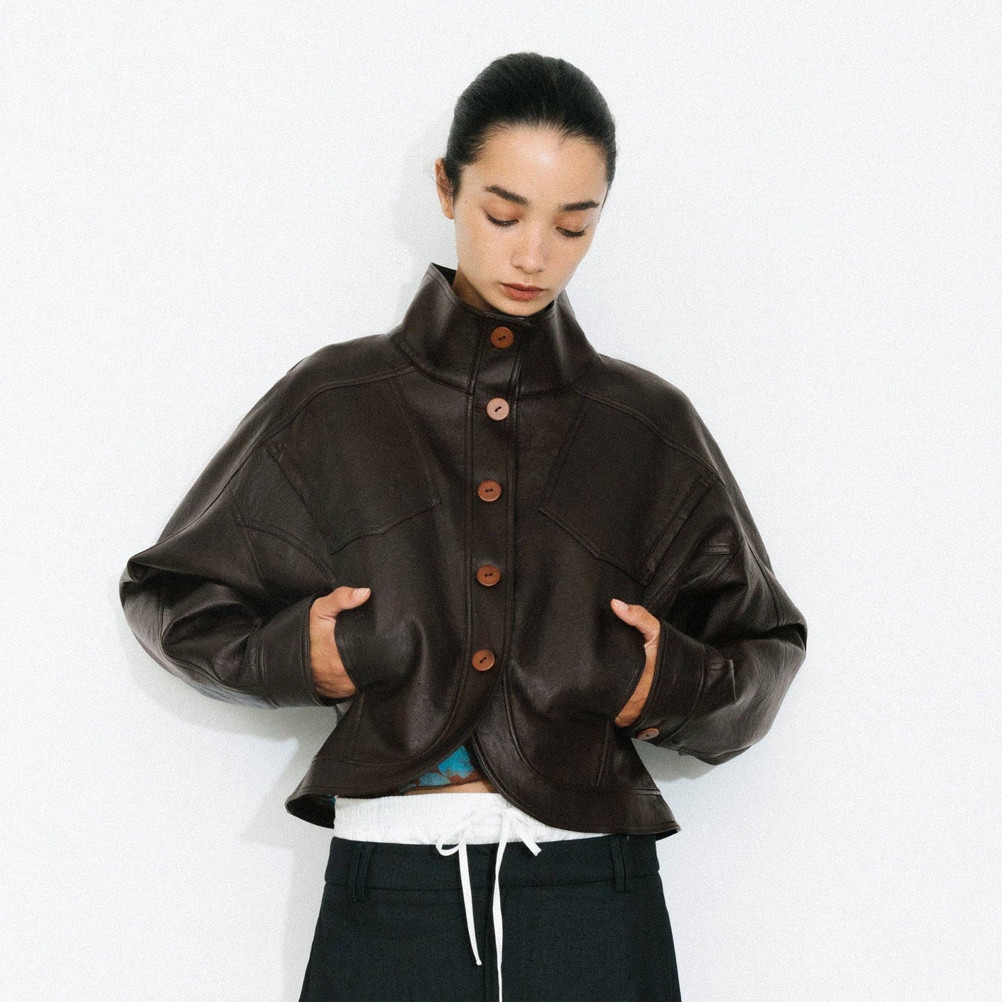 Curved Sleeve Faux Leather Jacket